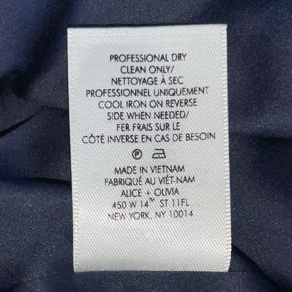 ALICE + OLIVIA | Metallic Conry Vegan Leather Cuff Shorts in Purple | Size 6 - Picture 9 of 10